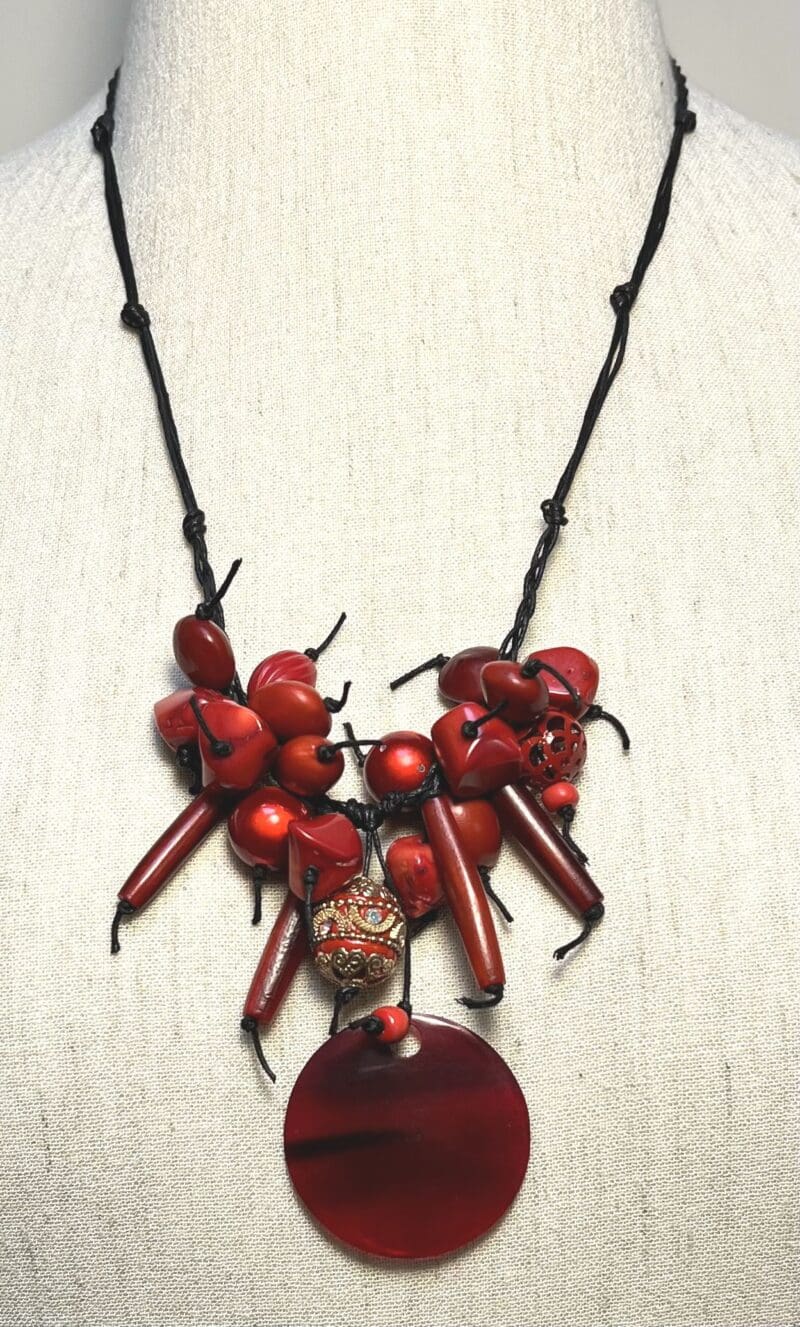 Variety of red beads and red/gold bead on black string short dangle necklace (N-384) - Image 2