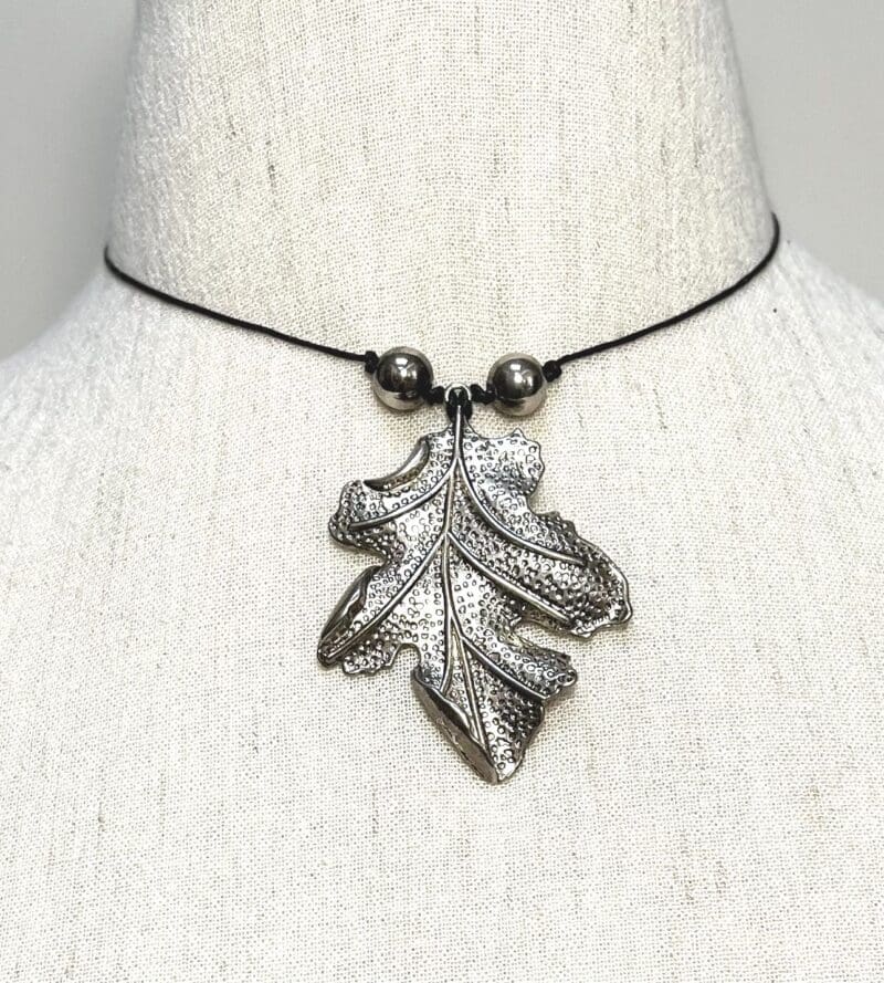 Silver oakleaf and beads on black string drop necklace (N-393)