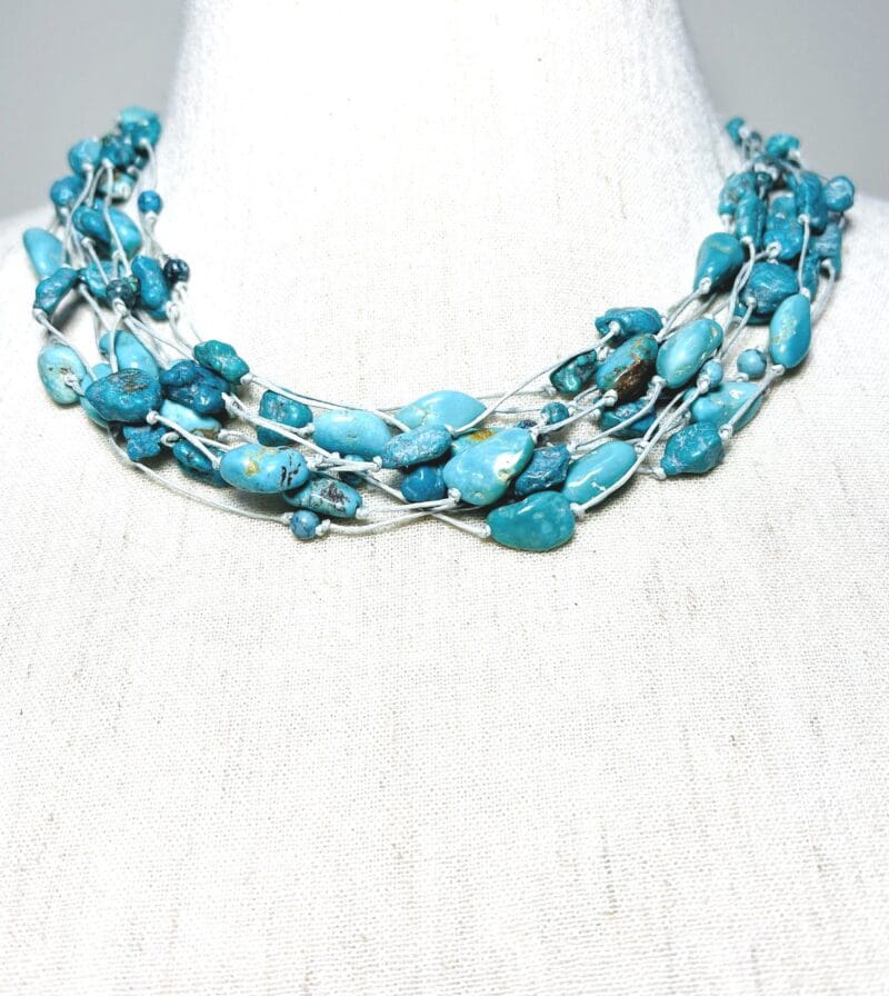 Turquoise chips 10-strand necklace on light grey string (N-411)