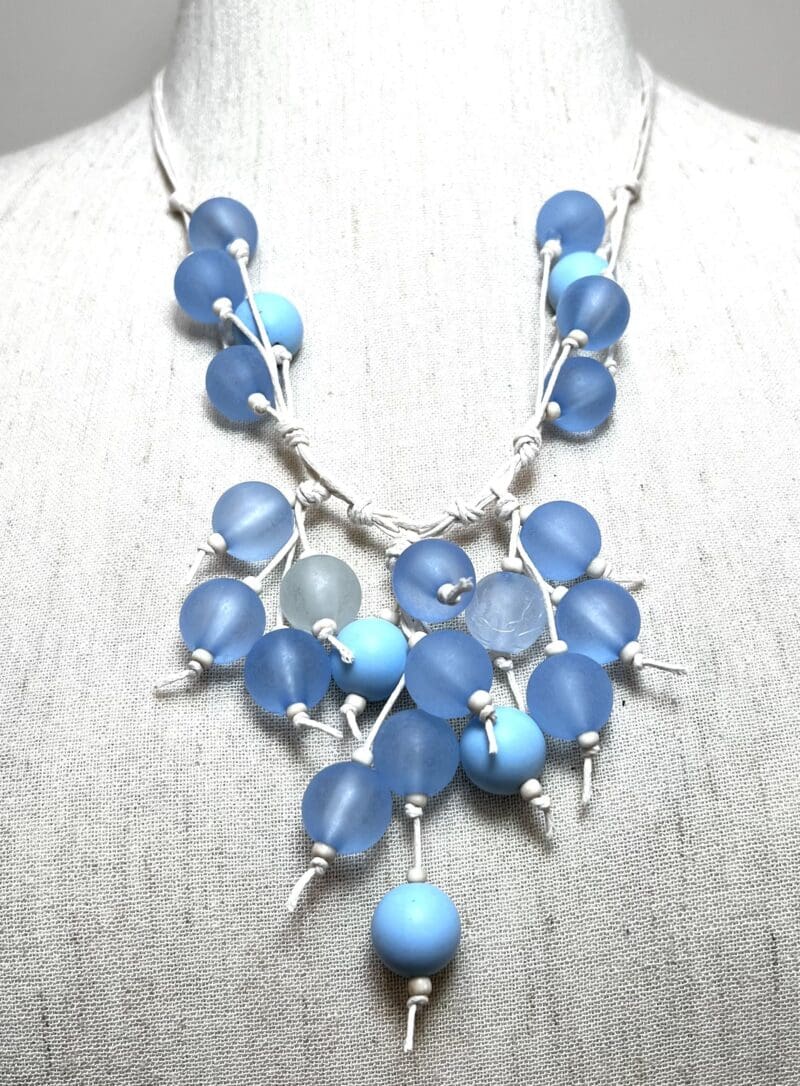 Translucent blue resin beads fancy dangle necklace on cream string (N-422)