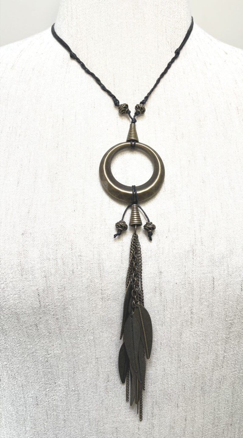 Dark bronze ring and leaf tassle fancy drop necklace on black string (N-425) - Image 2