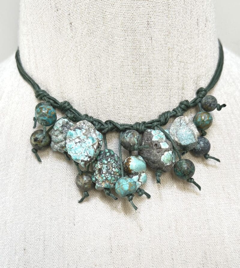 Turquoise chunk and African beads on dark green string dangle necklace (N-435)