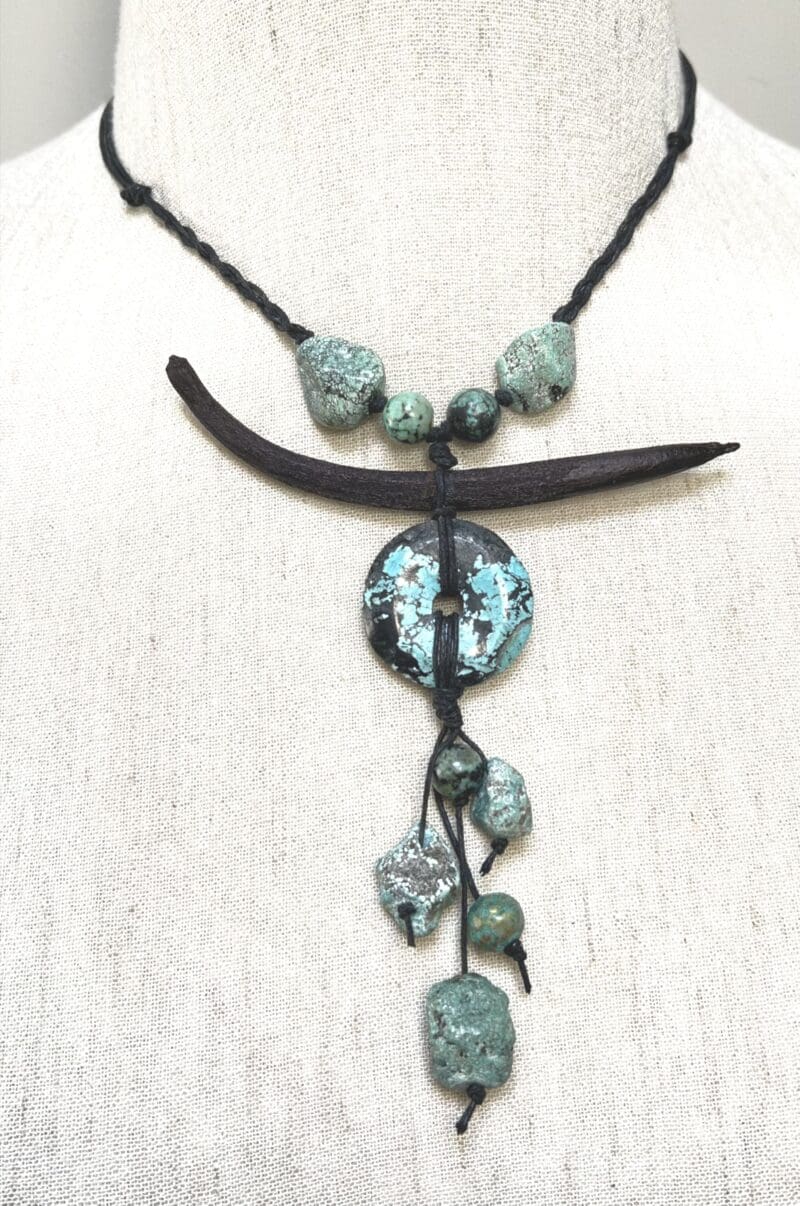 Turquoise chunks, beads, disc and mangrove seed fancy drop necklace on dark green string (N-436)