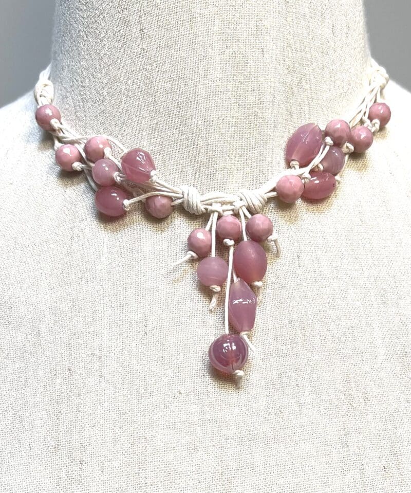 Variety of pink beads on fancy dangle necklace with cream string - Image 2