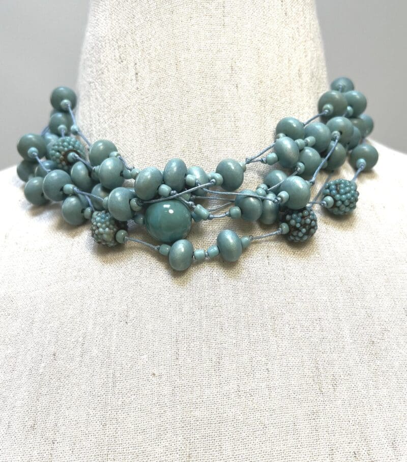 Variety of light turquoise wood and other beads 7-strand necklace on light blue string (N-443) - Image 2