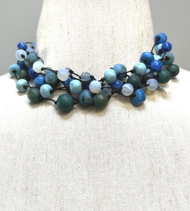 A variety of blue, turquoise and green beads 7-strand necklace on black string (N-445 - Image 2
