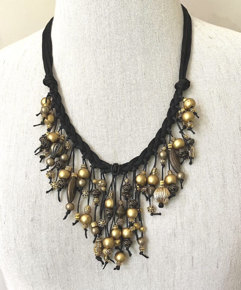 A variety of small gold beads on black string and cord dangle necklace (N-230) - Image 2